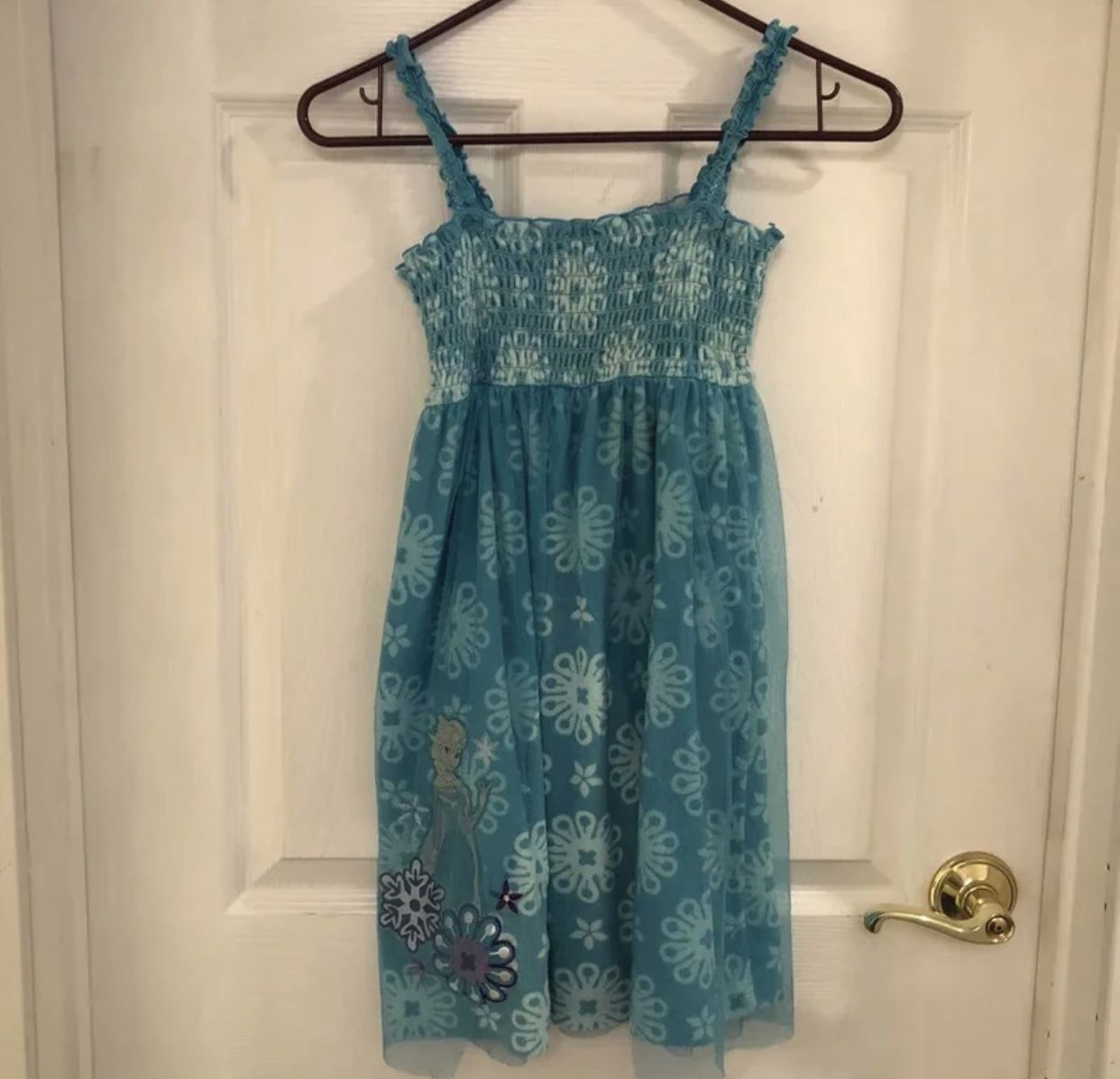 Size M 9/10 youth Frozen Terry cloth tank dress  Runs like a M  Has Elsa on it  Great for a swimsuit cover up  Has some wear but still in good conditi