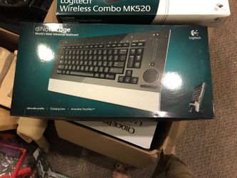 Logitech diNovo edge keyboard with integrated touch disc touchpad mouse, rechargeable, high tech, super cool wireless