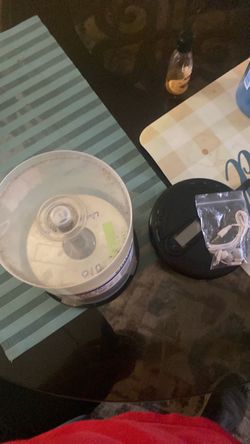Cd player with FM radio and a pile of cds