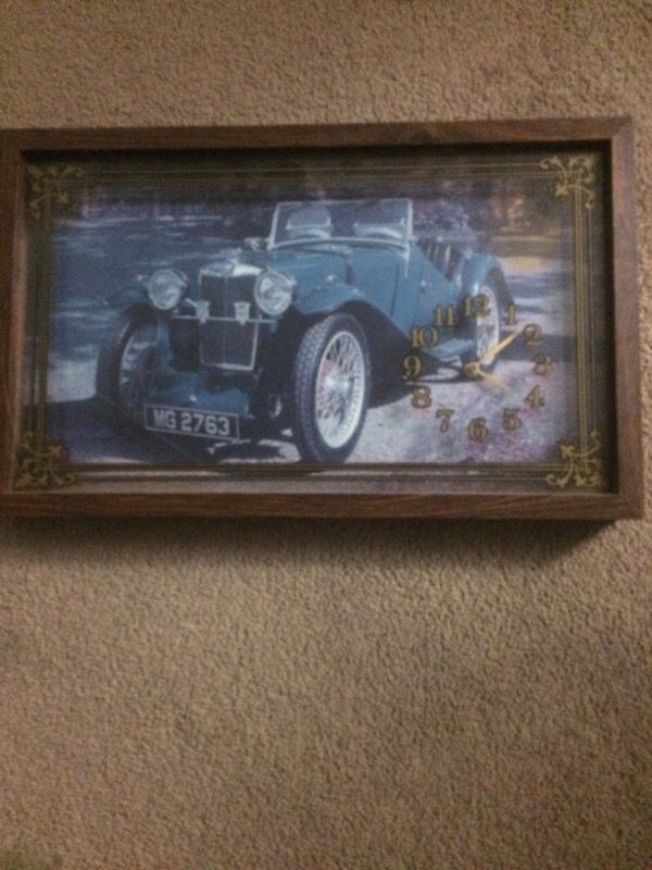 Framed picture/clock