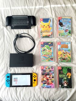 Nintendo Switch V1 Bundle + 6 Games – Mario Kart, Pokémon, Animal Crossing & More – $360