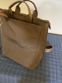 Stylish brown tote bag backpack