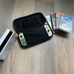 Nintendo Switch OLED + 5 Physical Games (Zelda, Mario Kart, Luigi’s Mansion, etc