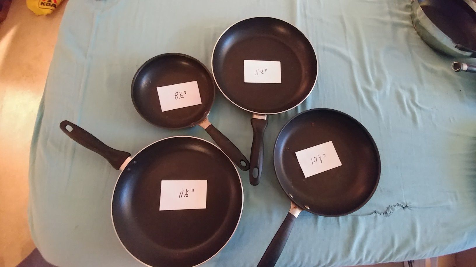 4 Good Size "non-stick" Cooking Pans. Gently used.