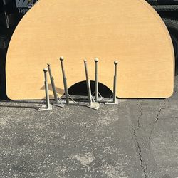 Half moon preschool tables, approximately 4’ x 6’ with adjustable legs for small chairs