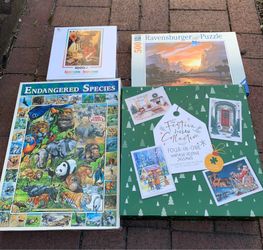 Puzzles all 4 boxes for $10 1 box has 4 puzzles the other 2 1000 pcs ea and 500 pcs