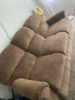 Brown reclining sofa
