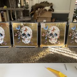 Hand foiled 24”x24” modern skull and butterfly lot of four signed by Parvez. Marmont Hill skull collection. (Two of the frames have small scuffs as se
