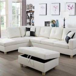 New White Leather Sectional And Ottoman 