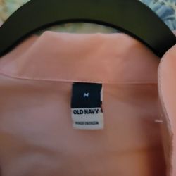 Brand New pink three quarter sleeves size medium