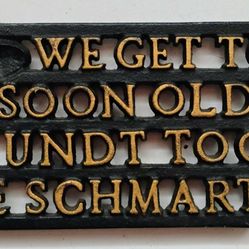 Dutch Amish Farmer Cast Iron Trivet