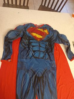 superman costume size medium fits around an 8/10