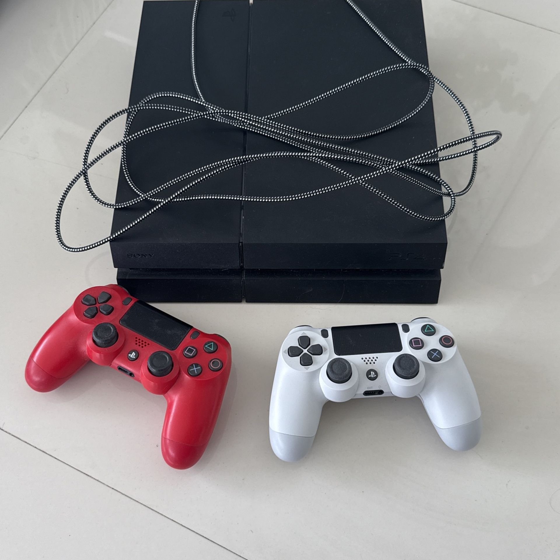 Ps4 1 Tb, Black + 2 Controllers +10ft Charging Cable and HDMI cable
