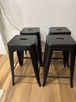 Black metal bar stools