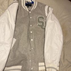 Sean John Men's Varsity Jacket featuring a gray body and white sleeves.  
