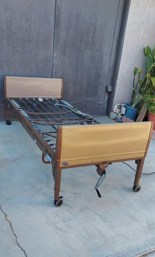 INVACARE TWIN SIZE ELECTRIC ADJUSTABLE MEDICAL BED