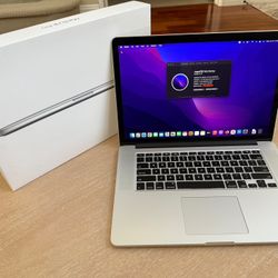 Apple Macbook Pro 15” Mid 2015, 16GB, 256GB, 2.2 Ghz Quad-core intel core i7. 