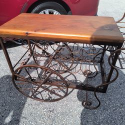 Elegant Vintage wrought iron wine cart , perfect for home decor.  Unique!