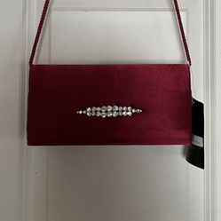 It’s A Beautiful Evening Clutch It’s Brand New. The Color Is Red. It’s Beautiful For Valentine’s Day.