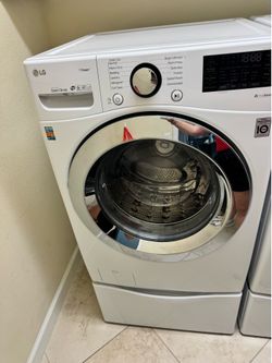 LG washer/ dryer with pedestal drawers