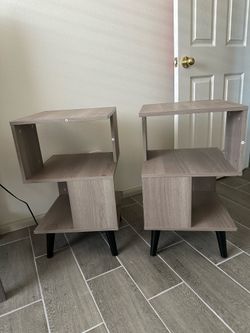 Light gray side tables