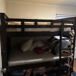 Free full-size bunkbeds. Sturdy. Needs To Be Painted. It Has a Lot Of Scratches. 