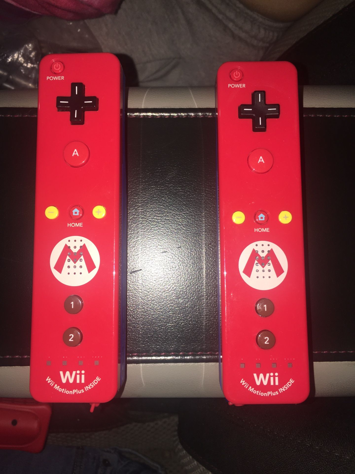 2 Mario wii controllers