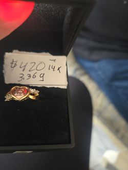 Make her Quinceañera unforgettable with this breathtaking solid 14K yellow gold "15" ring. This piece features a modern heart design with a bold numbe
