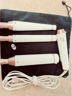 T3 interchangeable curling iron, in great condition! Comes with pouch and barrel attachment(s), no box.
