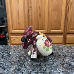 Vintage 1950's Ceramic Donkey with pair of Salt and Pepper Shakers hanging on the donkey.  Preowned missing 1 Stopper