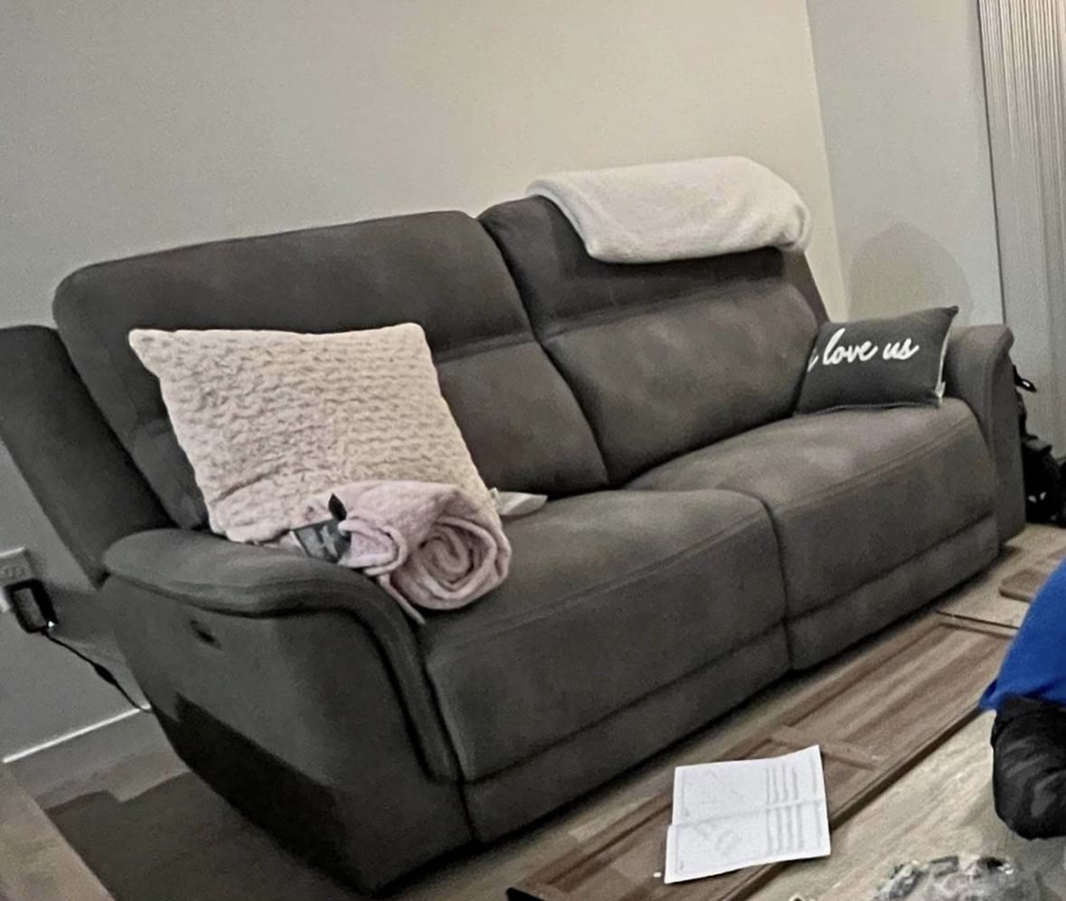 Reclining electric sofa with charging USB outlets & neck support feature