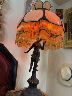 Bronze night lamp with a Venetian glass shade. Height: 36 inches; shade diameter: 16.5 inches; weight: 12 pounds.