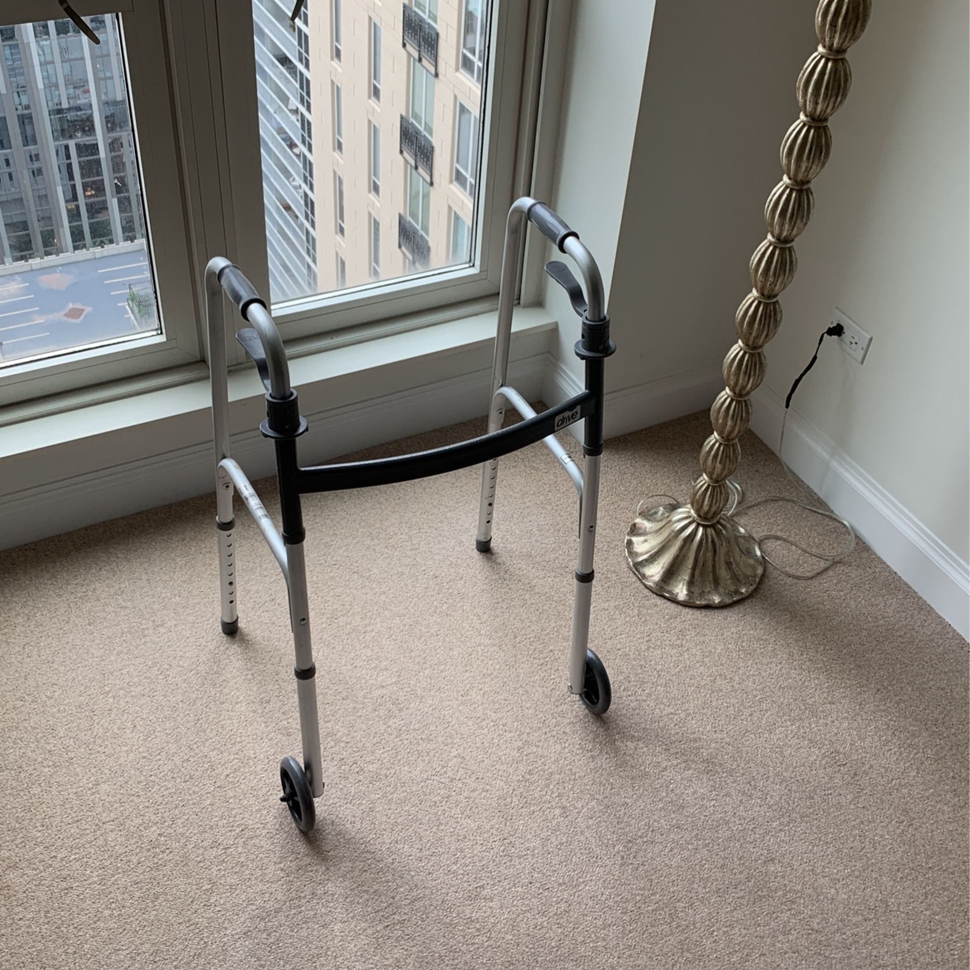 Adjustable walker by drive