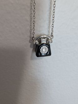 18" long telephone necklace in a silver tone