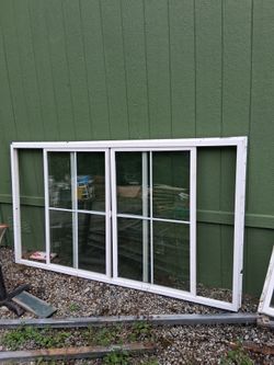 Large double pand dual slider window