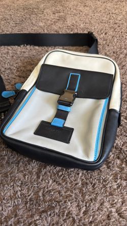 Blue Coach men’s hand bag