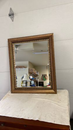 Gold framed mirror