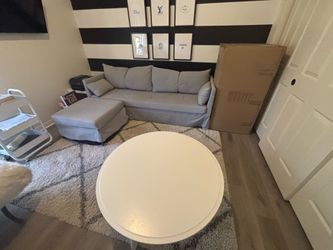 Sleeper bed sofa with ottoman and table