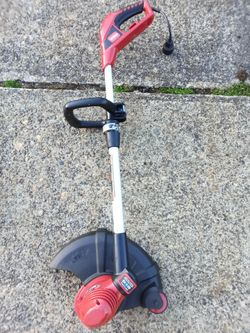 Toro 14" inch corded String Trimmer with 90' degree rotation and Edger Wheel