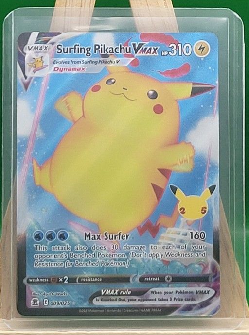 Surfing Pikachu VMAX 009/025
Celebrations Ultra Rare Holo
Pokemon TCG Card, NM