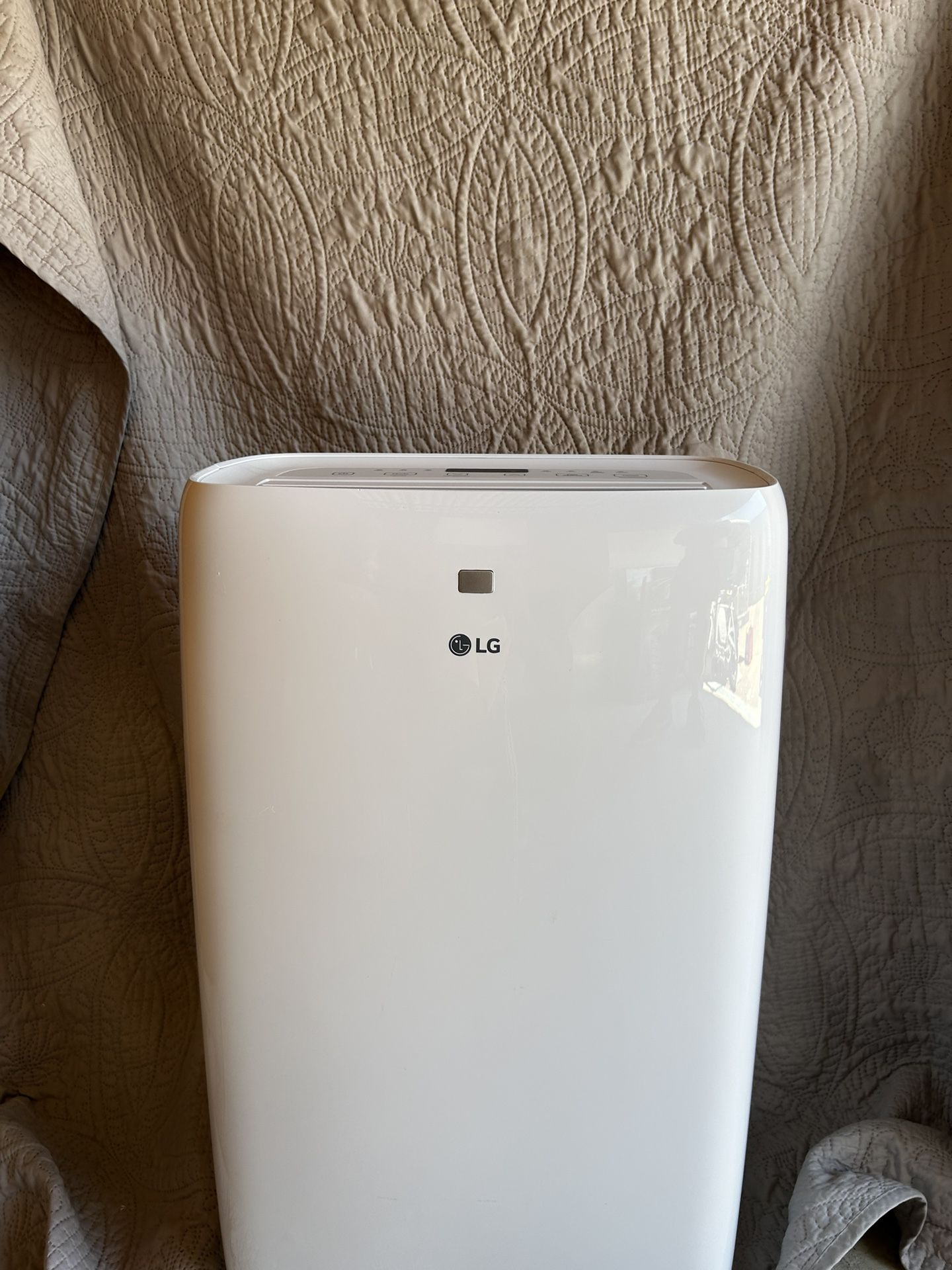 LG 6,000 BTU Portable Air Conditioner Cools 250 Sq. Ft. with Dehumidifier in White
