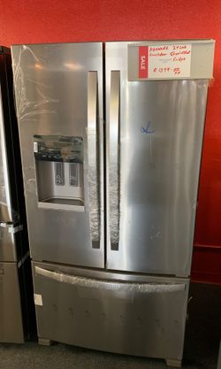 New scratch and dent whirlpool 25 ft.³ French door fridge stainless steel ice and water one year warranty