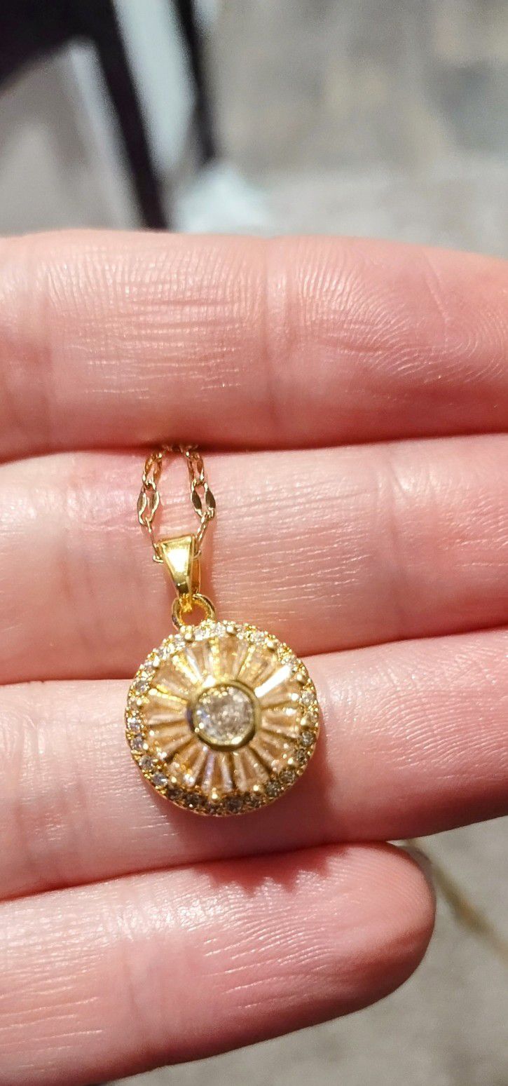 Gold Toned Silver Spinner Pendant Necklace