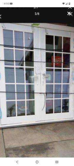 70x79 retro fit milgard vinyl exterior French door, swing out to the right, with keys , available now