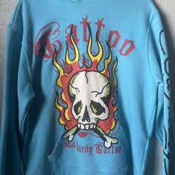 Blue ed hardy hoodie with skull and crossbones design
