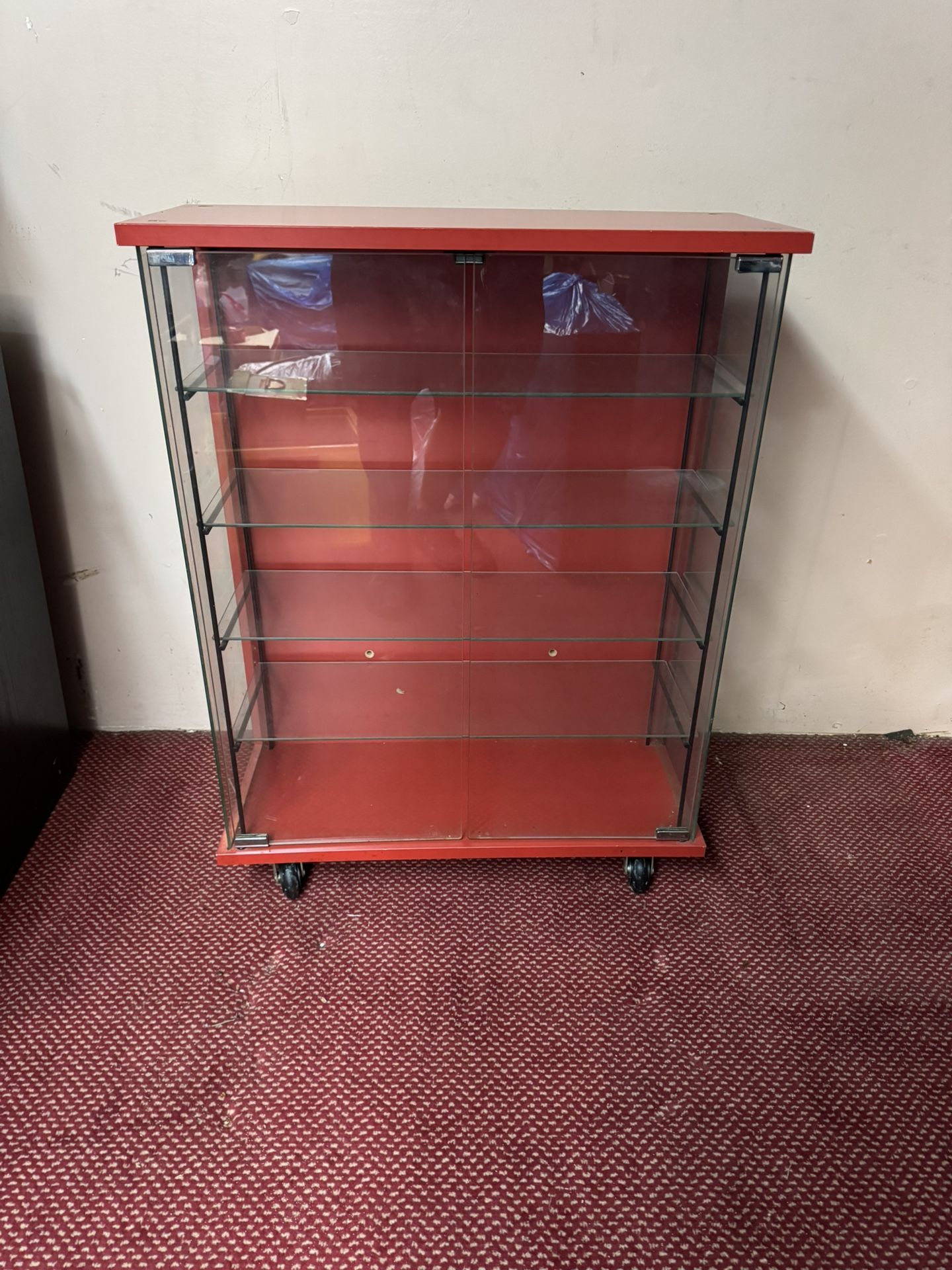Red Glass Display Accent Cabinet With Wheels 2 Glass Doors and 4 Glass shelves