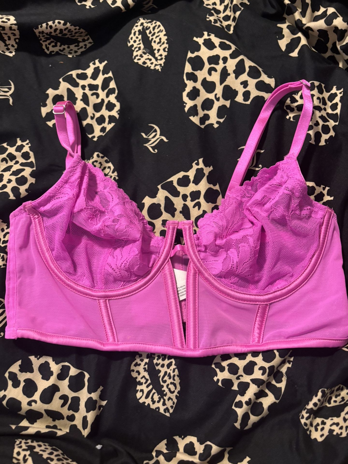 hot pink “corset” like crop top