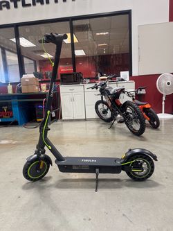 Front and rear double shock-absorbing electric scooter