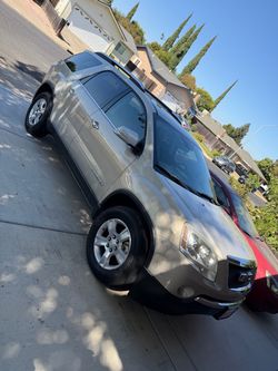 GMC Acadia SUV – Gold/Tan