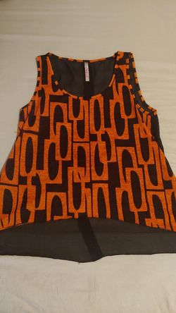 Orange and black see though back shirt with buttons